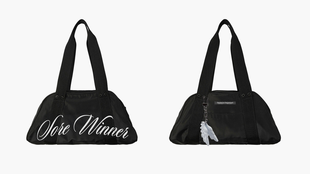 Black handbags with white text reading Winner and More Winner.