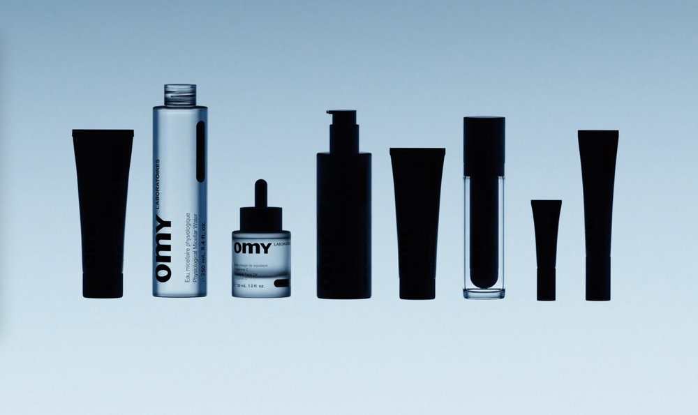 Various shapes and sizes of packaging for skincare and beauty products displayed in silhouette.