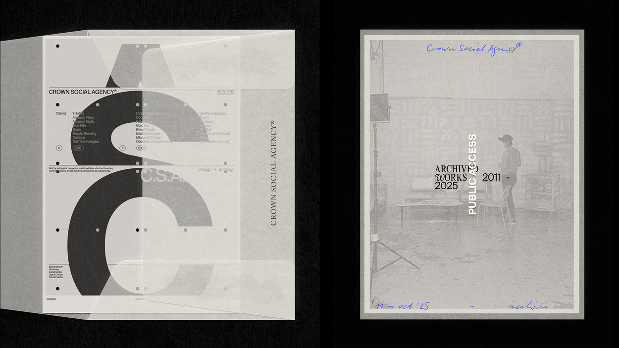 Three black and white posters on wall.